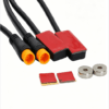 Close-up of ebike brake sensor 3pin connector, red adhesive stickers and metal magnets